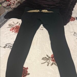 Black Victoria Secret fold over straight Leggings with Gold Wing Design on back